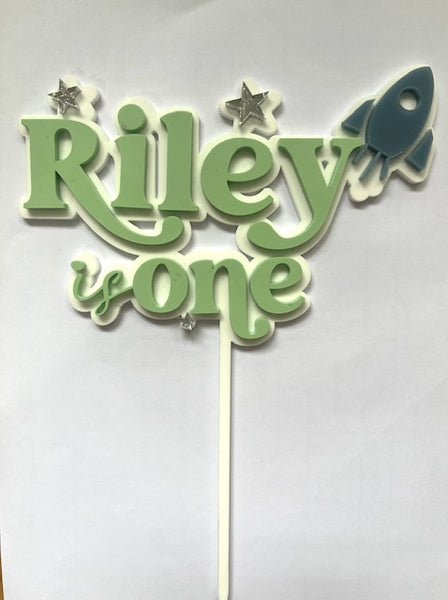 Riley is One Rocket cake topper in Sage